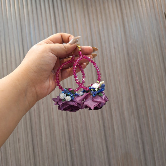 Purplish earrings bindi