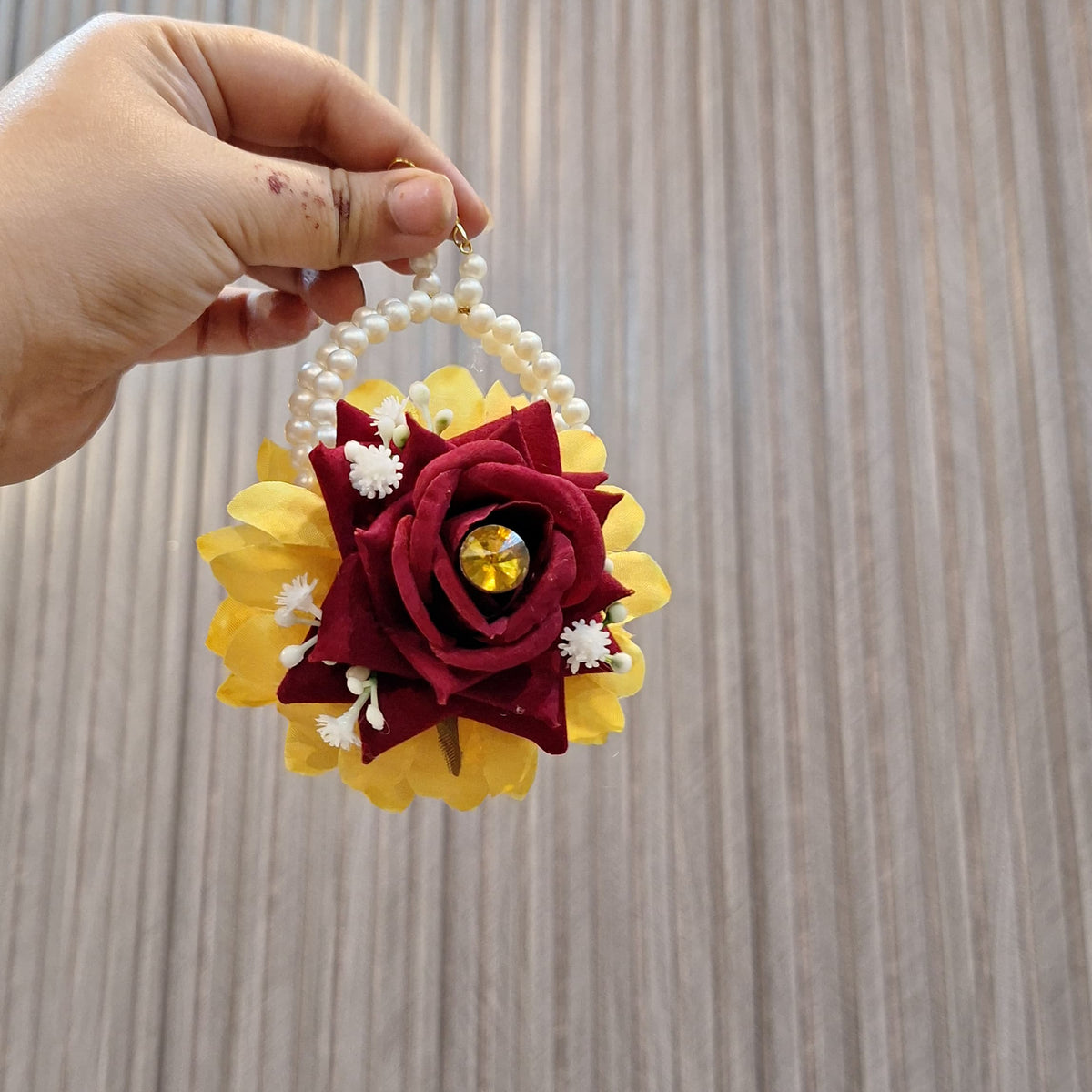 Close view of the flower and stone mix