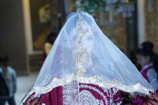 Close-up of superior craftsmanship and high-quality materials on a premium nikkah bridal veil.