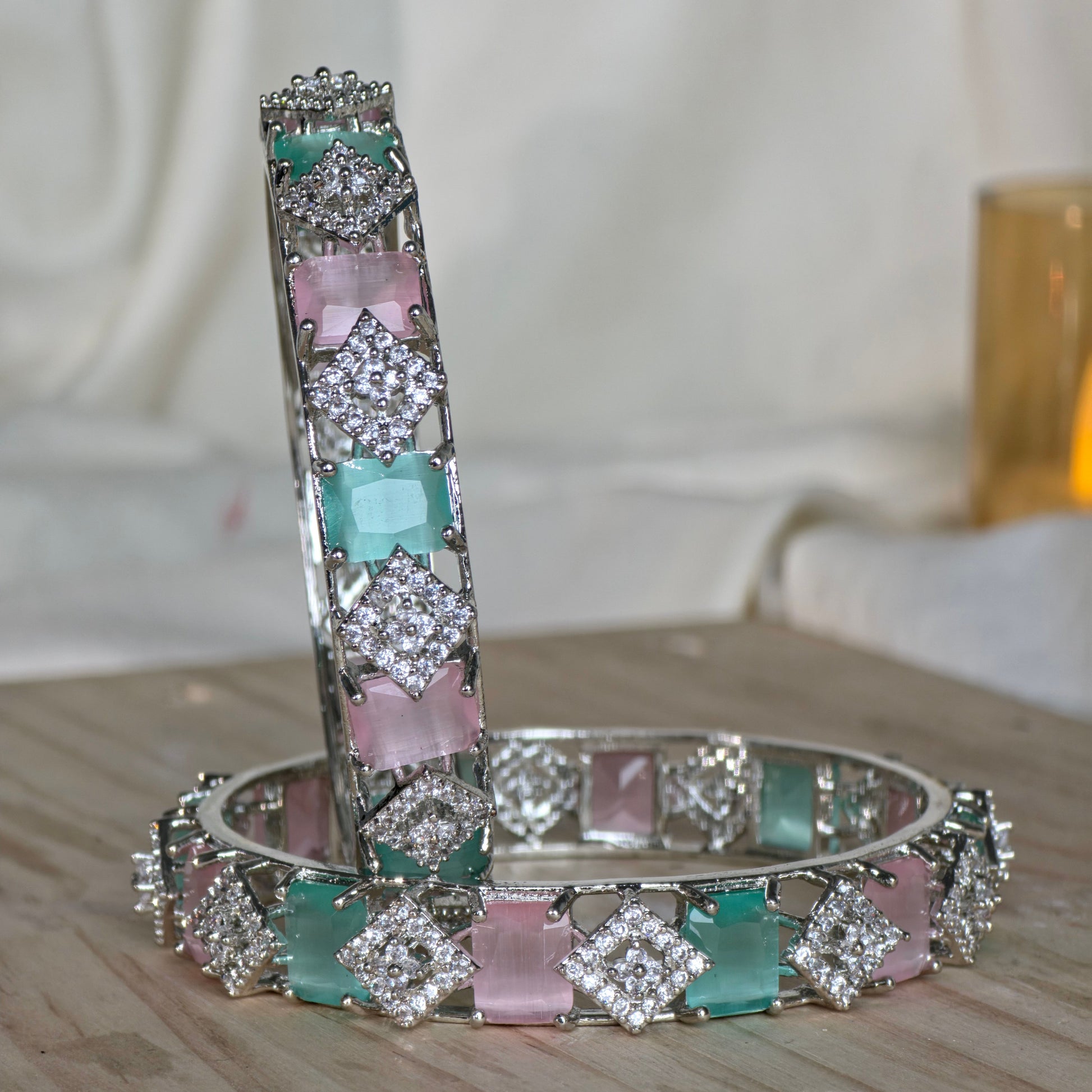 Earring with gemstones on a neutral background