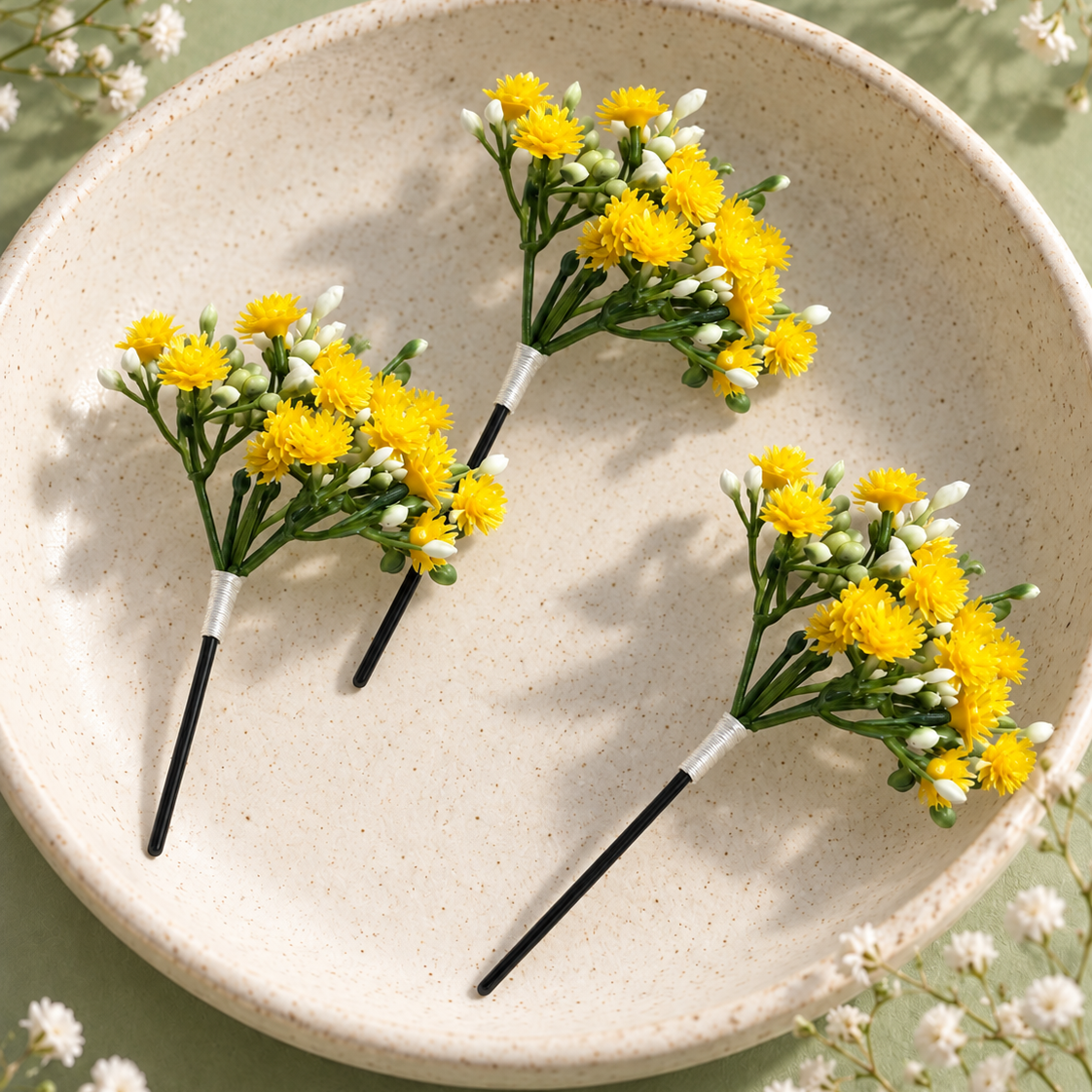 A delicate yellow floral hair accessory designed for elegant wedding and festive hair styling, photographed in a clean premium setup.