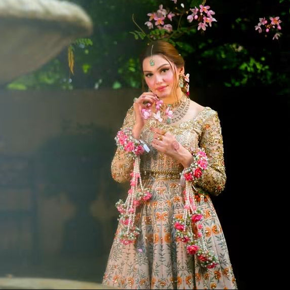 Complete long bridal gajra pair featuring soft pink rose clusters, tiny white floral fillers, greenery and multiple hanging pearl strands for Mehndi, Mayon and Dholki celebrations.