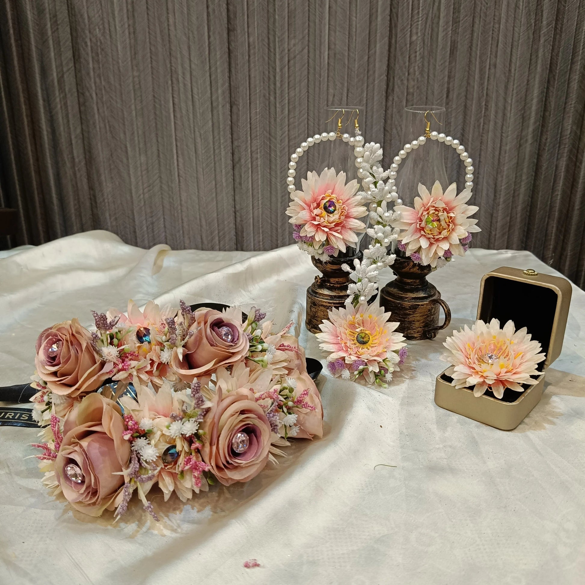 Peach bridal floral jewellery set with hand gajras, pearl hoop earrings, floral tikka and ring by De Fleuristes