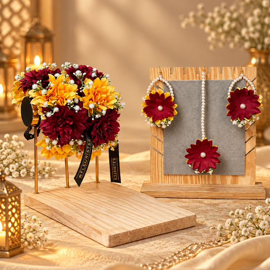 Complete Rang-e-Mehndi bridal floral jewellery set featuring deep maroon and warm yellow flowers, matching gajras, pearl-loop earrings and floral tikka for Pakistani Mehndi and Mayon celebrations.