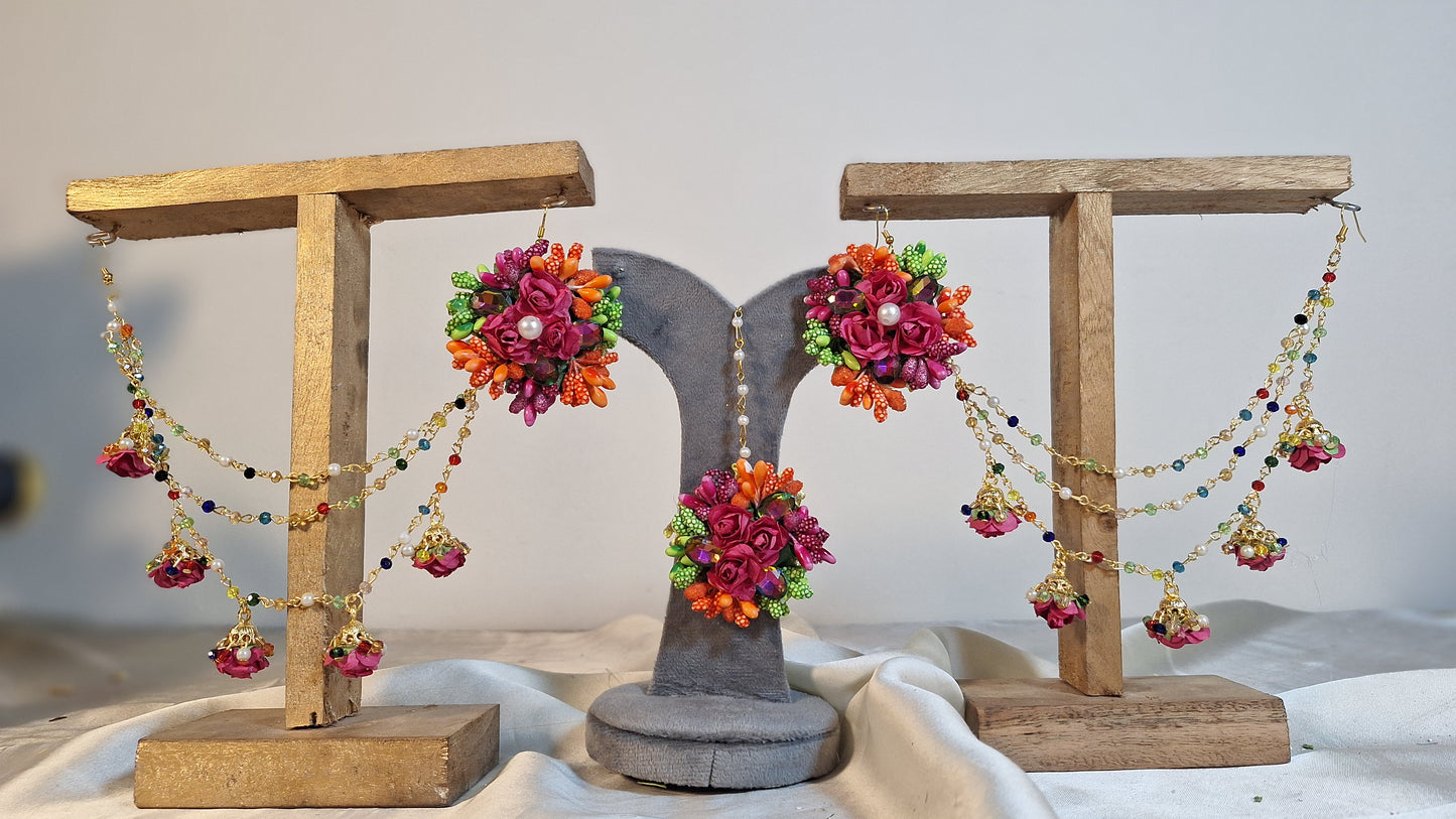 Colour Bloom bridal floral Jhumka Sahray earrings and matching Bindi set featuring vibrant multi-colored artificial flowers by De Fleuristes.