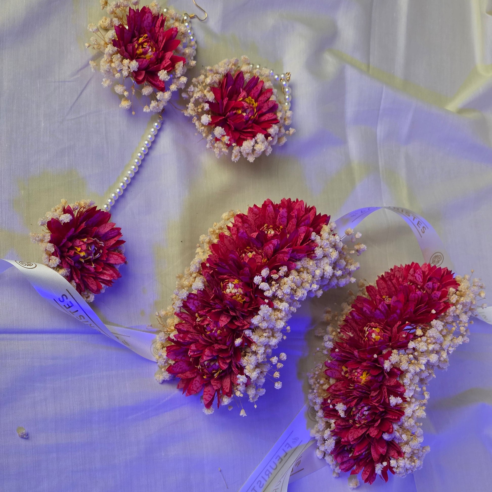 Full Dark Shine bridal floral jewelry set featuring premium artificial flowers and dried baby's breath by De Fleuristes.