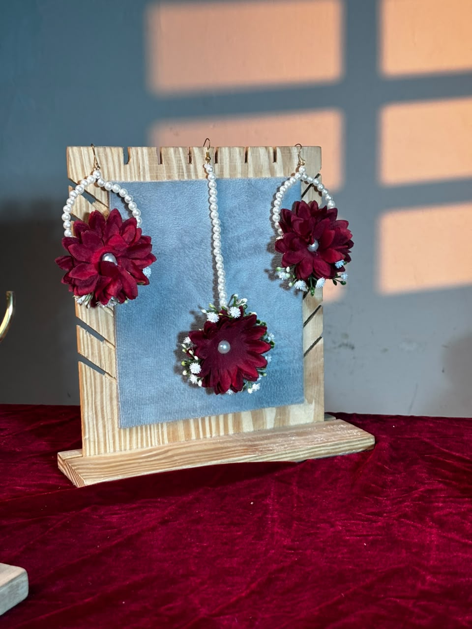 Maroon Bloom floral pearl hoop earrings with matching maang tikka