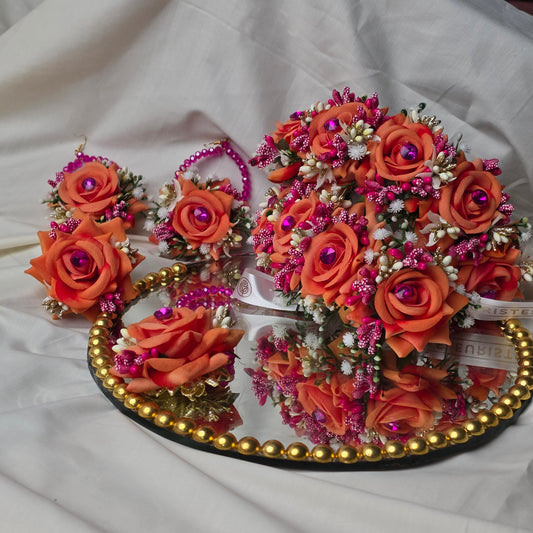 Complete orange artificial flower jewellery set for mehndi.