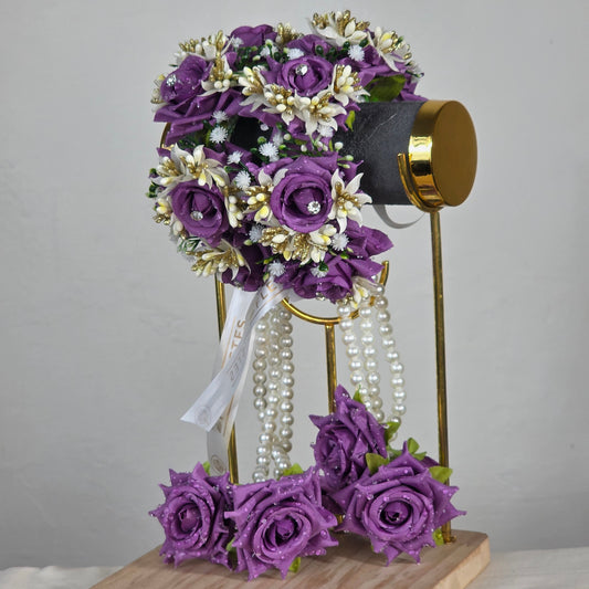 Set of purple flower k artificial kaleera gajra pair worn by a mehndi bride 