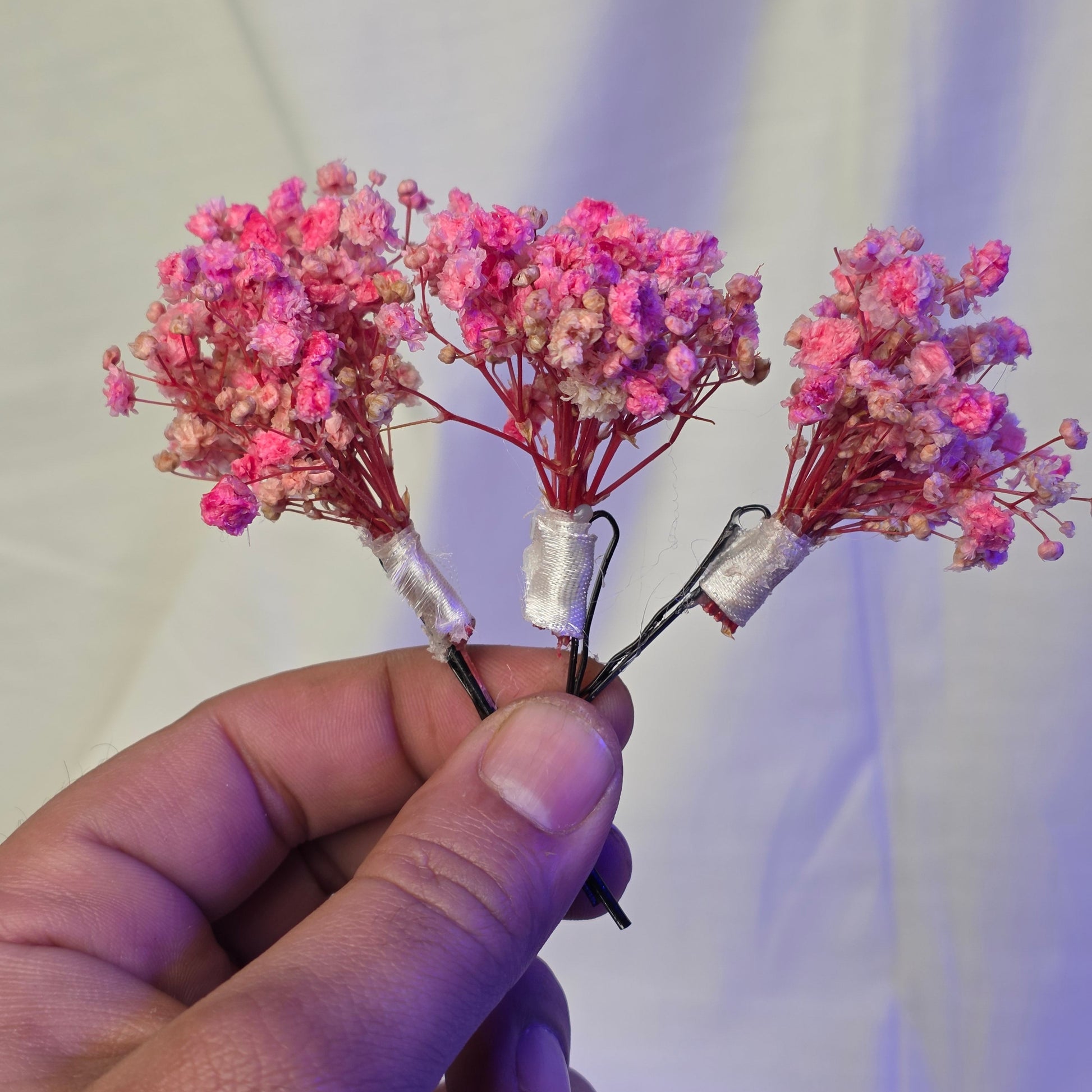 elicate pink dried baby's breath hair pins used for traditional Pakistani bridal Mehndi and Nikkah hairstyles by De Fleuristes.