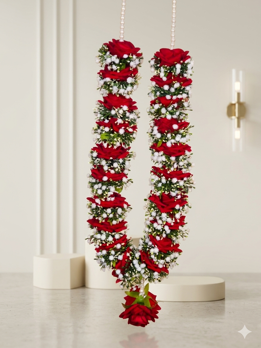 Exquisite handmade wedding garland with red artificial roses and white moti beads.