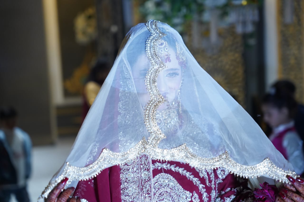 Close-up of superior craftsmanship and high-quality materials on a premium nikkah bridal veil.