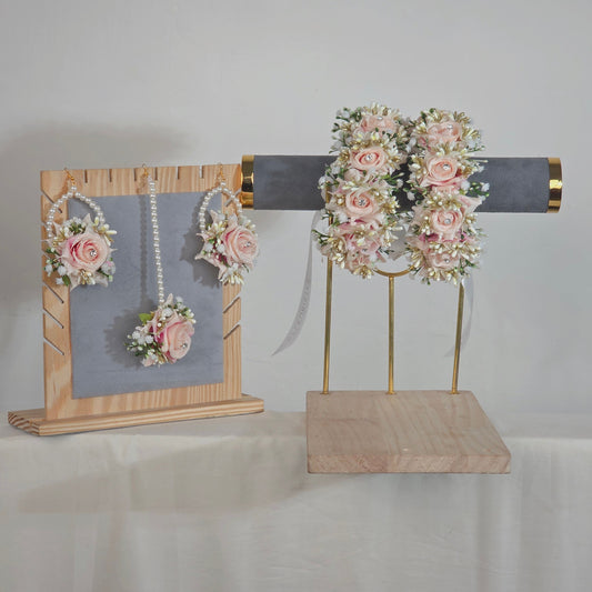 White and pink artificial  gajra pair worn by a mehndi bride. flowers jewelry set and gajra pair