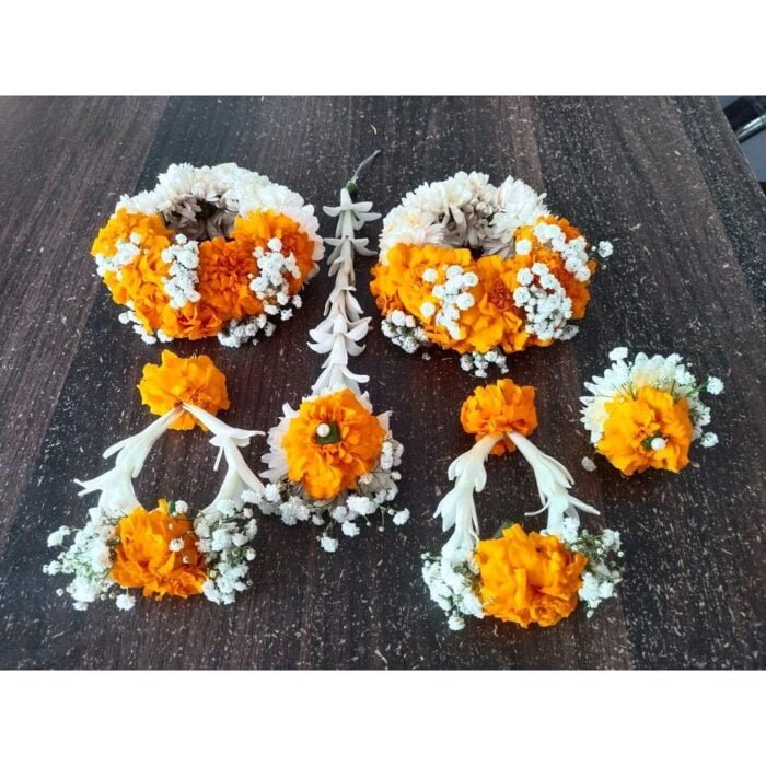 Yellow and white Jewelry Set mae with marigold and chrysanthemum also touch of babys breath