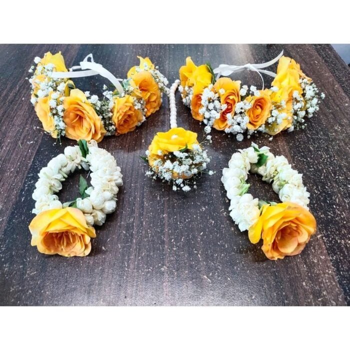 Yellow and white Floral Jewelry/ Brighten up your haldi, mehndi, or dholki ceremony with our stunning yellow and white floral jewelry.