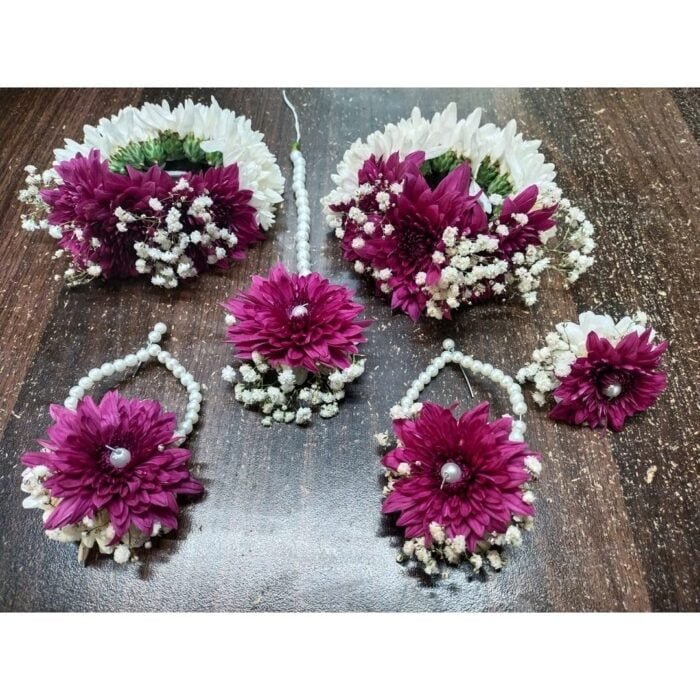 purple and white floral jewelry made with purple chrysanthemum with white Baby’s Breath to create a floral set for bridal